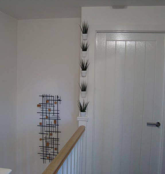 The finished result showing one of our houseplant display walls