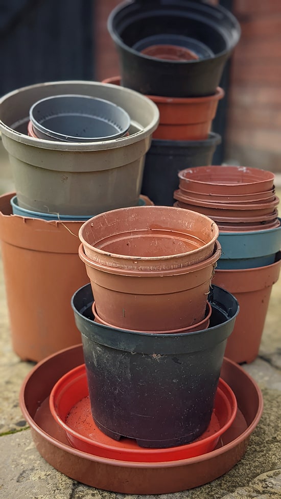 plastic plant pots stacked together